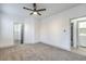 This main bedroom is spacious with a modern ceiling fan, en-suite bath, and walk-in closet at 7849 Montour Falls St, Las Vegas, NV 89149