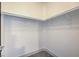 Bright walk-in closet offering ample storage with white shelving and space for organization at 7849 Montour Falls St, Las Vegas, NV 89149