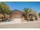 Charming single-story home with desert landscaping, a two-car garage, and a welcoming front entrance at 7957 Fantail Dr, North Las Vegas, NV 89084