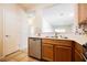 Bright kitchen features stainless steel appliances, white countertops, and a convenient dishwasher at 7957 Fantail Dr, North Las Vegas, NV 89084