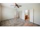 Spacious main bedroom with tile floors and access to the ensuite bathroom at 7957 Fantail Dr, North Las Vegas, NV 89084
