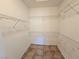 Spacious walk-in closet featuring wire shelving at 7957 Fantail Dr, North Las Vegas, NV 89084