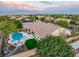 Expansive backyard with pool, spa, patio, and lush landscaping at 8356 Shady Lady Ct, Las Vegas, NV 89131