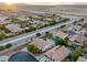 Overhead shot showing the neighborhood layout with pools and landscaping at 8356 Shady Lady Ct, Las Vegas, NV 89131