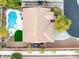 Aerial view showcases the backyard oasis with a pool, spa, and green space, surrounded by a well-maintained landscape at 8356 Shady Lady Ct, Las Vegas, NV 89131