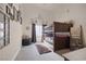 Charming bedroom with a cozy beanbag chair, bunk beds, and window with natural light at 8356 Shady Lady Ct, Las Vegas, NV 89131