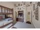 Spacious secondary bedroom features a bunkbed with decorative walls, shelving and carpeted floors at 8356 Shady Lady Ct, Las Vegas, NV 89131
