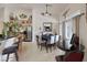 Dining area adjacent to the kitchen with a ceiling fan and views to backyard at 8356 Shady Lady Ct, Las Vegas, NV 89131