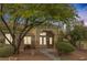 Welcoming entryway with double doors and desert landscaping at 8356 Shady Lady Ct, Las Vegas, NV 89131