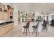 Open kitchen with stainless steel appliances, breakfast bar, and ample cabinet storage at 8356 Shady Lady Ct, Las Vegas, NV 89131