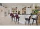 Spacious kitchen with bar seating, granite countertops, and ample cabinet space at 8356 Shady Lady Ct, Las Vegas, NV 89131