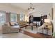Cozy living room with plush seating and a view of the pool at 8356 Shady Lady Ct, Las Vegas, NV 89131