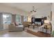 Cozy living room with comfortable seating and lots of natural light at 8356 Shady Lady Ct, Las Vegas, NV 89131
