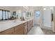 Main bathroom with double sinks, large mirror, and walk-in shower at 8356 Shady Lady Ct, Las Vegas, NV 89131