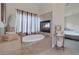 Soaking tub with fireplace featuring an elegant design with tile surround at 8356 Shady Lady Ct, Las Vegas, NV 89131