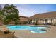 Private backyard pool and spa with an outdoor seating area at 8356 Shady Lady Ct, Las Vegas, NV 89131
