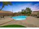 Inviting backyard pool and spa, surrounded by lush landscaping and a spacious patio perfect for outdoor entertaining at 8356 Shady Lady Ct, Las Vegas, NV 89131