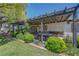 This back patio has a cozy outdoor seating area, perfect for entertaining and enjoying the backyard view at 853 Morning Sun Ct, Las Vegas, NV 89110