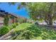 This is a beautiful shot of the property's spacious backyard, showing its many areas for relaxing and entertaining at 853 Morning Sun Ct, Las Vegas, NV 89110