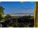 Expansive city views from the property, showcasing the vibrant Las Vegas skyline and surrounding mountains at 853 Morning Sun Ct, Las Vegas, NV 89110