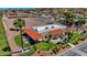 The HOA clubhouse offers community residents tables and chairs for relaxing outdoors in a landscaped setting at 853 Morning Sun Ct, Las Vegas, NV 89110