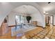 Bright dining room featuring tile floors and chandelier at 853 Morning Sun Ct, Las Vegas, NV 89110
