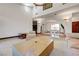 Spacious living room featuring high ceilings, neutral color palette, and arched doorways to other rooms at 853 Morning Sun Ct, Las Vegas, NV 89110
