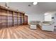 Spacious living room with custom built-in bookcase and comfortable seating arrangement at 853 Morning Sun Ct, Las Vegas, NV 89110