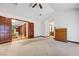 Spacious main bedroom with decorative dark-wood closet and vanity at 853 Morning Sun Ct, Las Vegas, NV 89110