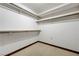 Functional walk-in closet with built in shelving at 853 Morning Sun Ct, Las Vegas, NV 89110