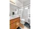 Clean bathroom with a shower/tub combo and a wood vanity at 930 High Plains Dr, Henderson, NV 89002