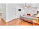 Bright bedroom with ceiling fan, hardwood floors, and ample natural light at 930 High Plains Dr, Henderson, NV 89002
