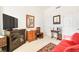 Cozy bedroom featuring a workspace and comfortable seating arrangement at 9921 Woodhouse Dr, Las Vegas, NV 89134