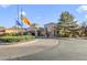 Community clubhouse with beautiful stone accents and manicured landscaping at 9921 Woodhouse Dr, Las Vegas, NV 89134
