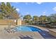 Community hot tub surrounded by mature landscaping and privacy fencing at 9921 Woodhouse Dr, Las Vegas, NV 89134
