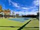 Outdoor tennis court on a sunny day, offering a great space for exercise and friendly competition at 9921 Woodhouse Dr, Las Vegas, NV 89134