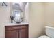 Bathroom featuring a modern vessel sink, tile flooring, and a modern toilet at 10159 Tumbling Tree St, Las Vegas, NV 89183