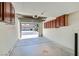 Spacious two car garage with attached storage cabinets and automatic door at 10159 Tumbling Tree St, Las Vegas, NV 89183