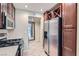 Gourmet kitchen featuring stainless steel appliances, ample storage, and a modern design at 10159 Tumbling Tree St, Las Vegas, NV 89183