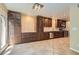 Spacious kitchen features stainless steel appliances, tile flooring, and modern cabinetry at 10159 Tumbling Tree St, Las Vegas, NV 89183