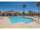 Community pool with ample lounge chairs and shaded seating at 10159 Tumbling Tree St, Las Vegas, NV 89183