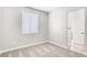 Bedroom with a window and plush carpet flooring and neutral paint at 1124 Coral Rainbow Ave, Las Vegas, NV 89123