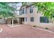 Exterior elevation showcasing a backyard with a covered patio at 1124 Coral Rainbow Ave, Las Vegas, NV 89123