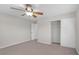 Cozy bedroom with a closet and a ceiling fan providing a serene and comfortable space at 11273 Accademia Ct, Las Vegas, NV 89141