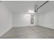 Spacious two car garage with painted walls and concrete floors at 11273 Accademia Ct, Las Vegas, NV 89141