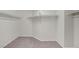 Walk-in closet with built-in shelving and carpet flooring providing organized storage space at 11273 Accademia Ct, Las Vegas, NV 89141