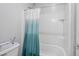Bathroom featuring shower-tub combo with decorative shower curtain at 12273 Catanzaro Ave, Las Vegas, NV 89138