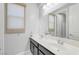 Bright bathroom with a dual sink vanity and well-lit mirror at 12273 Catanzaro Ave, Las Vegas, NV 89138