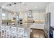 Spacious, modern kitchen featuring a large granite island, stainless steel appliances, and ample cabinet space at 12273 Catanzaro Ave, Las Vegas, NV 89138