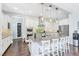 Stylish kitchen with a spacious island, stainless steel appliances, and modern lighting fixtures at 12273 Catanzaro Ave, Las Vegas, NV 89138